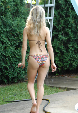 18 year old cutie Christine Paradise pulling denim shorts aside